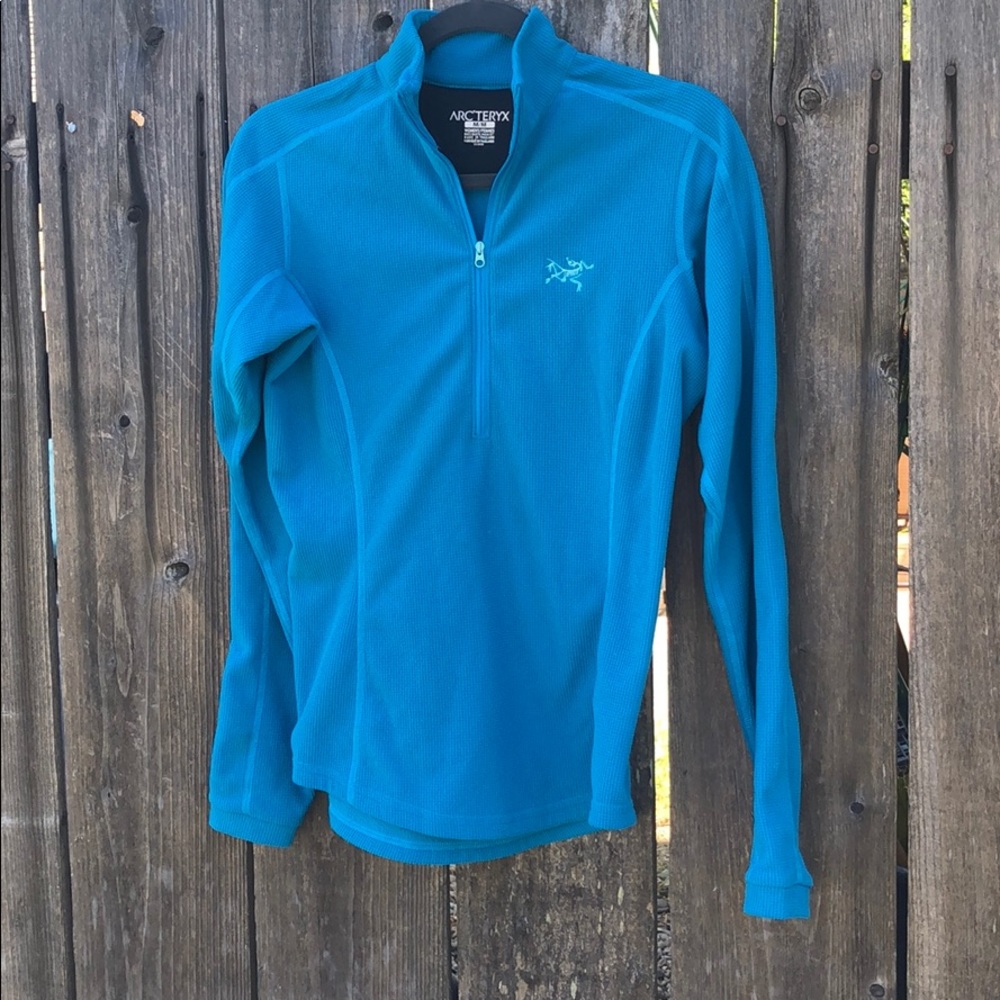 Teal Arc’teryx women’s half zip thermal